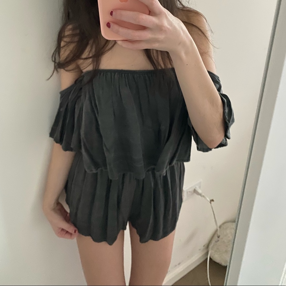 Off the shoulder adorable grey romper. Super flattering and unworn brand new.